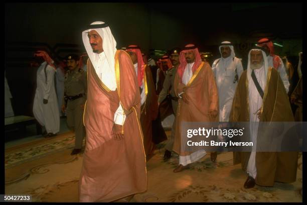 Riyadh Gov. Prince Salman , w. Entourage in tow, before/after holding daily majlis , in post-gulf war Riyadh, Saudi Arabia.