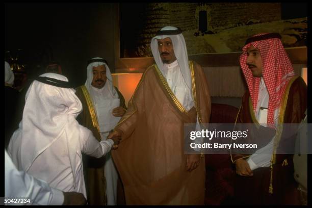 Riyadh Gov. Prince Salman , shaking subject's hand, during daily majlis in post-gulf war Riyadh, Saudi Arabia.