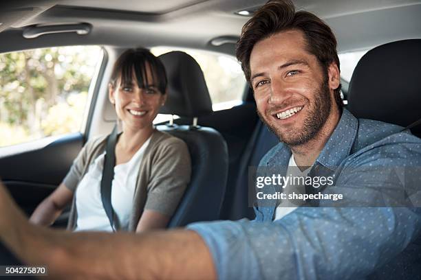 we're taking a couple's roadtrip - front passenger seat stock pictures, royalty-free photos & images