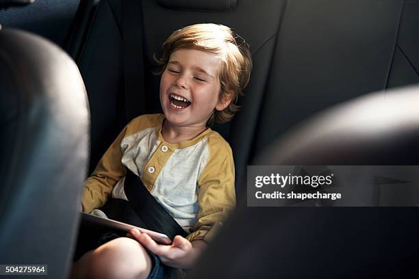 he's having a laugh - auto tablet stockfoto's en -beelden