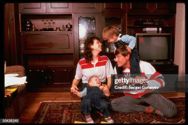 Soviet pole vaulter Sergei Bubka w. Wife & 2 young sons.