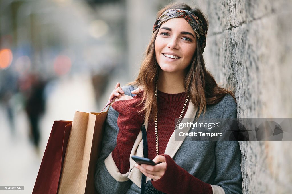 Shopping and texting on a winter day.