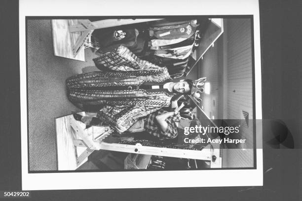 Mouseketeer & acrobat Ricky Luna being dressed in a kingly robe and crown by unident. Wardrobe lady backstage at the Mickey Mouse Club set at...