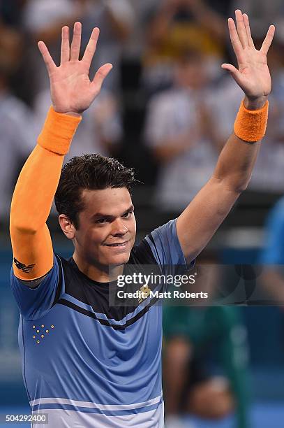 Milos Raonic of Canada celebrates winning the Mens Final against Roger Federer of Switzerland during day eight of the 2016 Brisbane International at...
