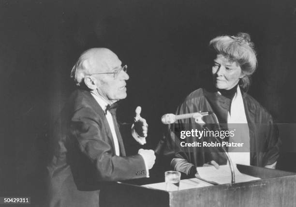 Actress Katharine Hepburn and director George Cukor speaking at a party in his honor.