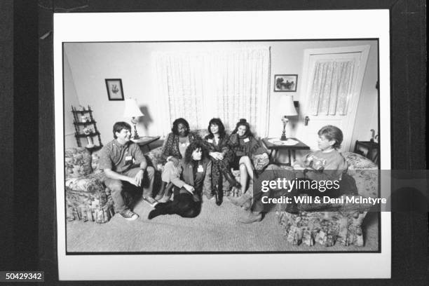 Former cast members of the TV show The Waltons David Harper Judy Norton-Taylor Kami Cotler Jon Walmsley & two others, chatting as they sit in living...