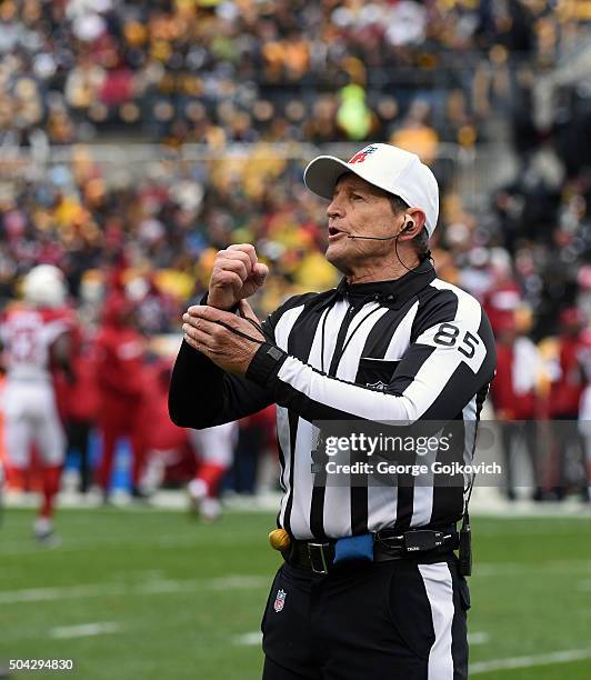 National Football League referee Ed Hochuli signals during a game between the Arizona Cardinals and Pittsburgh Steelers at Heinz Field on October 18,...