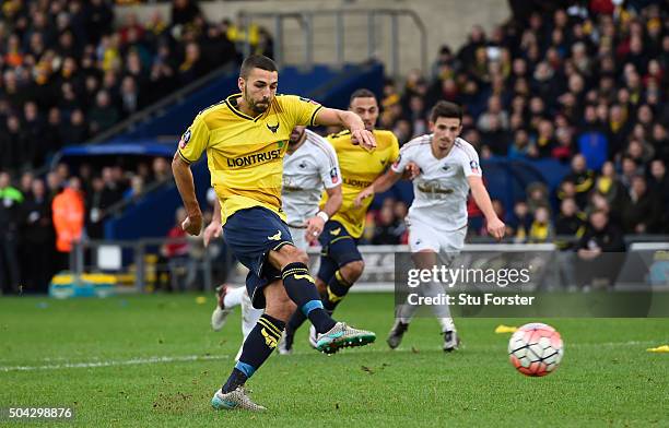 Liam Sercombe of Oxford United scores from the penalty spot to level the scores at 1-1 during The Emirates FA Cup third round match between Oxford...