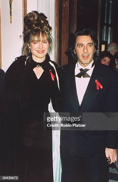 Actor Al Pacino w. His girlfriend, dir. Lyndall Hobbs, at Moving Image party in his honor for being a double-Oscar nominee, at the Waldorf-Astoria.