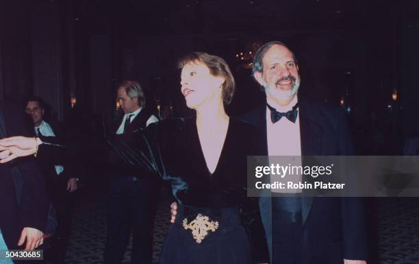 Movie dir. Brian DePalma w. His wife, producer Gale Anne Hurd at Museum of the Moving Image party in honor of actor Al Pacino at the Waldorf-Astoria.