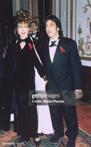 Actor Al Pacino w. his girlfriend, dir. Lyndall Hobbs, at Moving