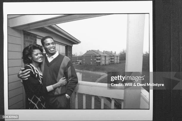 Bernadette Locke-Mattox, asst. Basketball coach at Univ. Of KY, cuddling happily w. Her husband Vince Mattox, a consultant to the Kentuck Dept. Of...