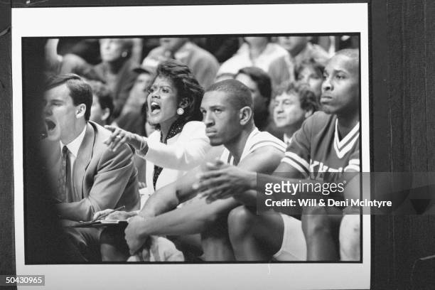 Bernadette Locke-Mattox, asst. Basketball coach at Univ. Of KY , screaming at her team as she sits on bench w. Fellow asst. Coach Billy Donovan &...