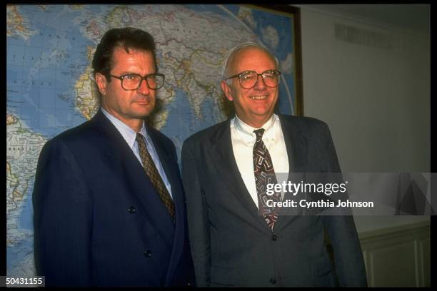 Def. Secy. Les Aspin w. German For. Min. Klaus Kinkel, framed by wall map in Aspin's Pentagon office.