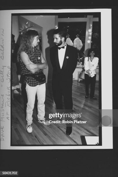 Actor Billy Baldwin chatting w. Musician Dave Mustaine fr. The rock group Megadeth at the Reebok party for Dem. Supporters during the wk. Of the Dem....