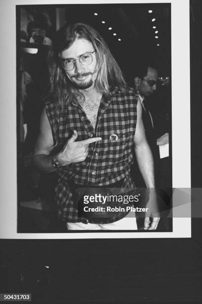 Musician Dave Mustaine fr. The rock group Megadeth, pointing at his ROCK THE VOTE button while attending the Reebok party for Dem. Supporters during...