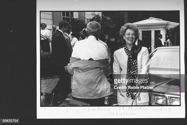 Matilda Cuomo, wife of NY Gov. Mario Cuomo, arriving at the Reebok party for Dem. Supporters, w. NYC Mayor David Dinkins standing nearby, during the...