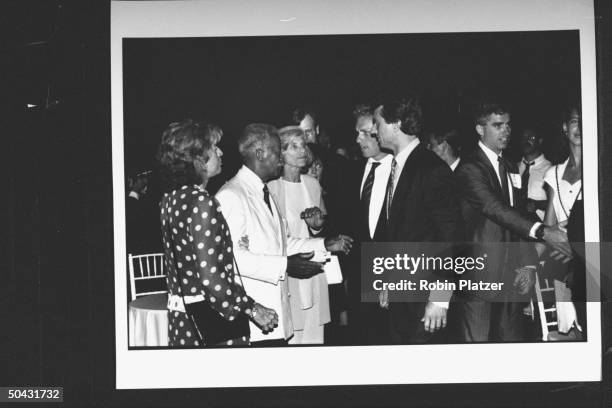 Mayor David Dinkins chatting w. Eunice Shriver Joseph Kennedy & Bobby Kennedy Jr. At the Reebok party for Dem. Supporters during the wk. Of the Dem....