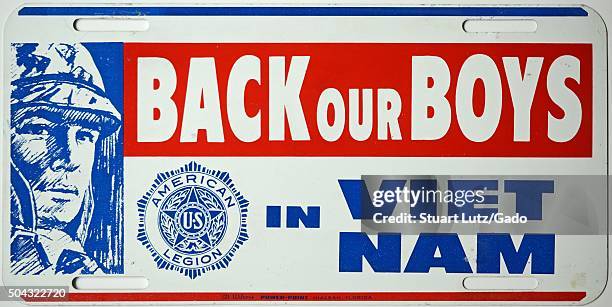 Back Our Boys in Vietnam, license plate from the American Legion supporting soldiers in the Vietnam War, with red, white and blue lettering and a...