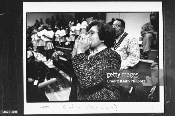Surgeon Gen. Nominee Dr. Joycelyn Elders w. Her hand clasped to her mouth, rooting on the Hall HS basketball team, which is coached by her husband...