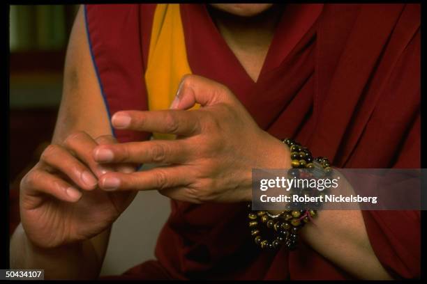 Gesturing hands of exiled Tibetan spiritual ldr. Dalai Lama during TIME interview in Dharamsala, India.