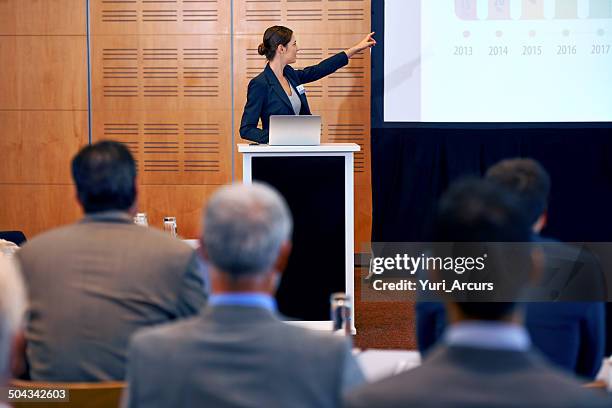 confidently taking control of the press conference - press release stock pictures, royalty-free photos & images