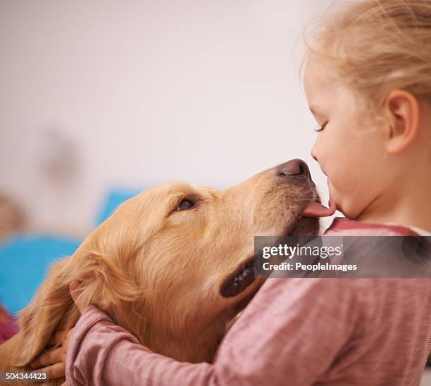 kisses from my best friend - dog licking girls stock pictures, royalty-free photos & images