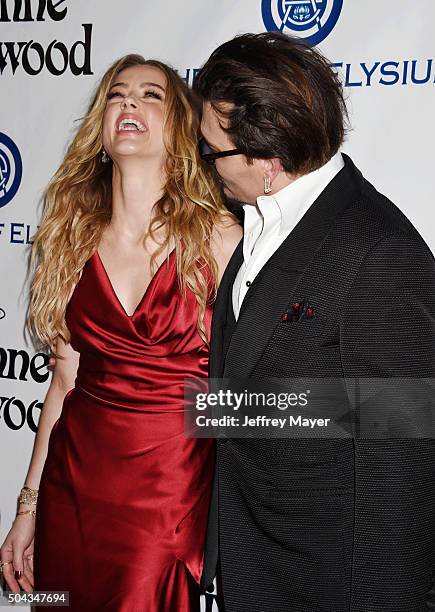 Actors Amber Heard and Johnny Depp attend the Art of Elysium 2016 HEAVEN Gala presented by Vivienne Westwood & Andreas Kronthaler at 3LABS on January...