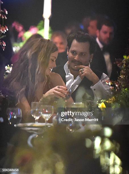 Actors Amber Heard and Johnny Depp attend The Art of Elysium 2016 HEAVEN Gala presented by Vivienne Westwood & Andreas Kronthaler at 3LABS on January...