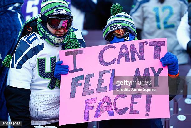 Seattle Seahawks fan holds a sign during the NFC Wild Card Playoff game between the Minnesota Vikings and the Seattle Seahawks at TCFBank Stadium on...