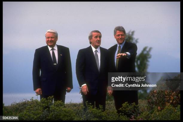 Pres. Bill Clinton, Canadian PM Brian Mulroney & Russian Pres. Boris Yeltsin poised outside.