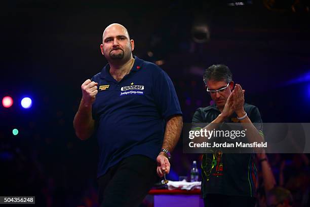 Scott Waites of England celebrates winning the Men's final match against Jeff Smith of Canada during Day Nine of the BDO Lakeside World Professional...