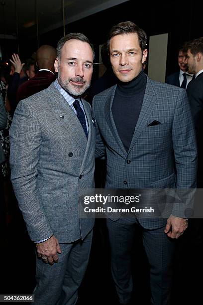 David Furnish and Paul Sculfor attend a dinner hosted by Tommy Hilfiger and Dylan Jones to celebrate The London Collections Men AW16 at Mortons on...