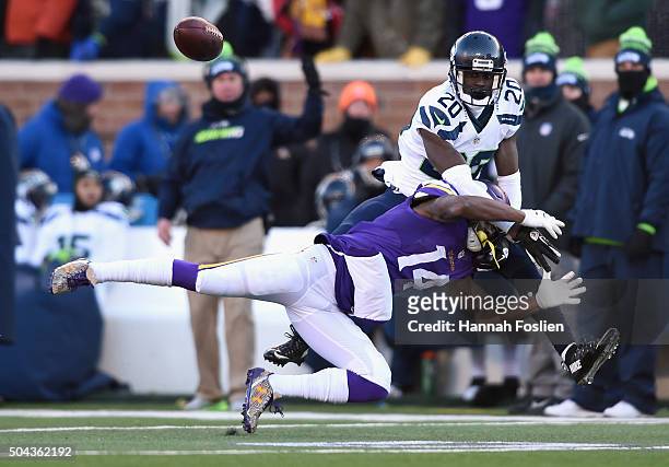 Jeremy Lane of the Seattle Seahawks defends a pass intended for Stefon Diggs of the Minnesota Vikings in the fourth quarter during the NFC Wild Card...