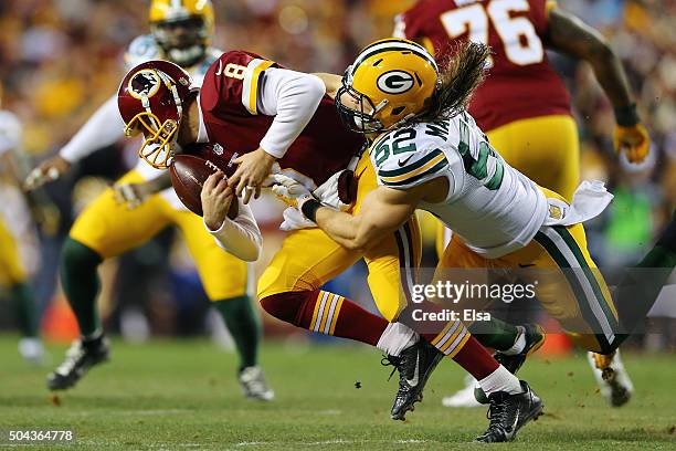 Inside linebacker Clay Matthews of the Green Bay Packers sacks quarterback Kirk Cousins of the Washington Redskins in the first quarter during the...