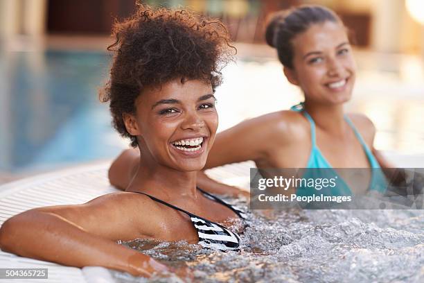 the girls are having some fun today - girls in hot tub stockfoto's en -beelden