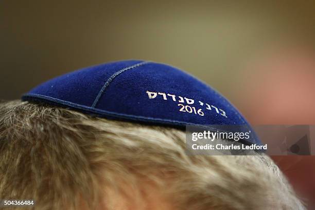 Marc Daniels, of Springfield, Illinois, travels from one campaign event to another selilng what he calls "Presidential Yarmulkes." He is wearing a...