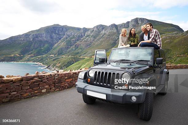 stopping to experience the breathtaking view - jeep stock pictures, royalty-free photos & images