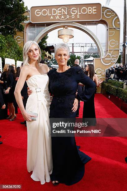 73rd ANNUAL GOLDEN GLOBE AWARDS -- Pictured: Actors Annie Guest and Jamie Lee Curtis arrive to the 73rd Annual Golden Globe Awards held at the...