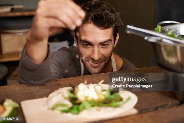 just a dash of secret ingredient - food preparation stockfoto's en -beelden