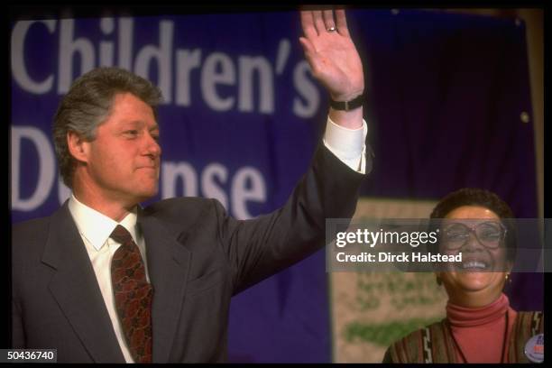 Pres. Bill Clinton waving during speech to Children's Def. Fund event, w. CDF head Marian Wright Edelman .