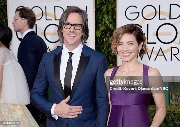 73rd ANNUAL GOLDEN GLOBE AWARDS -- Pictured: Writer/producer Charles Randolph and actress Mili Avital arrive to the 73rd Annual Golden Globe Awards...