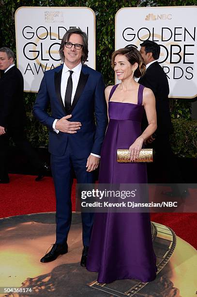 73rd ANNUAL GOLDEN GLOBE AWARDS -- Pictured: Writer/producer Charles Randolph and actress Mili Avital arrive to the 73rd Annual Golden Globe Awards...