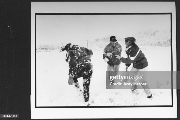 Olympic skier Picabo Street squealing w. Laughter as she is under heavy, snow-flailing attack fr. Her bro. Baba & their friend Tara Bell during a...