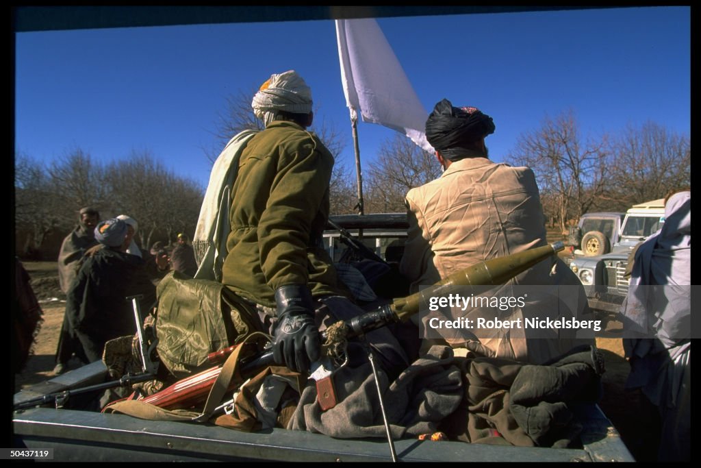 Taliban fighters at HQ taken fr. opposit