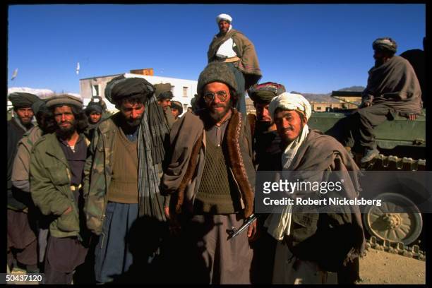 Taliban fighters at HQ taken fr. Opposition Hekmatyar mujahedin by radical Islamic cleric-led faction on top in civil war, nr. Govt-held Kabul.