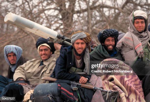Taliban fighters at new radical Islamic faction's HQ, taken fr. Opposition Hekmatyar mujahedin by maj. Student army on top in factional civil war.