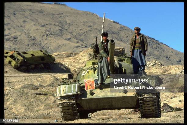 Rabbani govt. Tank w. Pic of Def. Min. Massoud at garrison above city in civil war calm w. Rout of Hekmatyar mujahedin by Taliban faction.