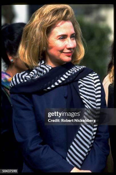 1st Lady Hillary Rodham Clinton poised outside while visiting Islamabad College for girls, on Asian tour w. Daughter Chelsea.