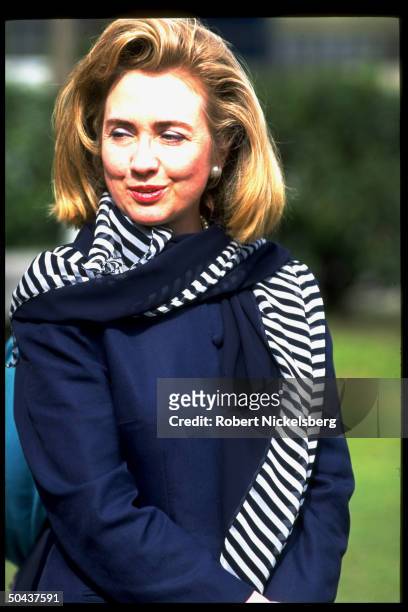 1st Lady Hillary Rodham Clinton poised outside while visiting Islamabad College for girls, on Asian tour w. Daughter.